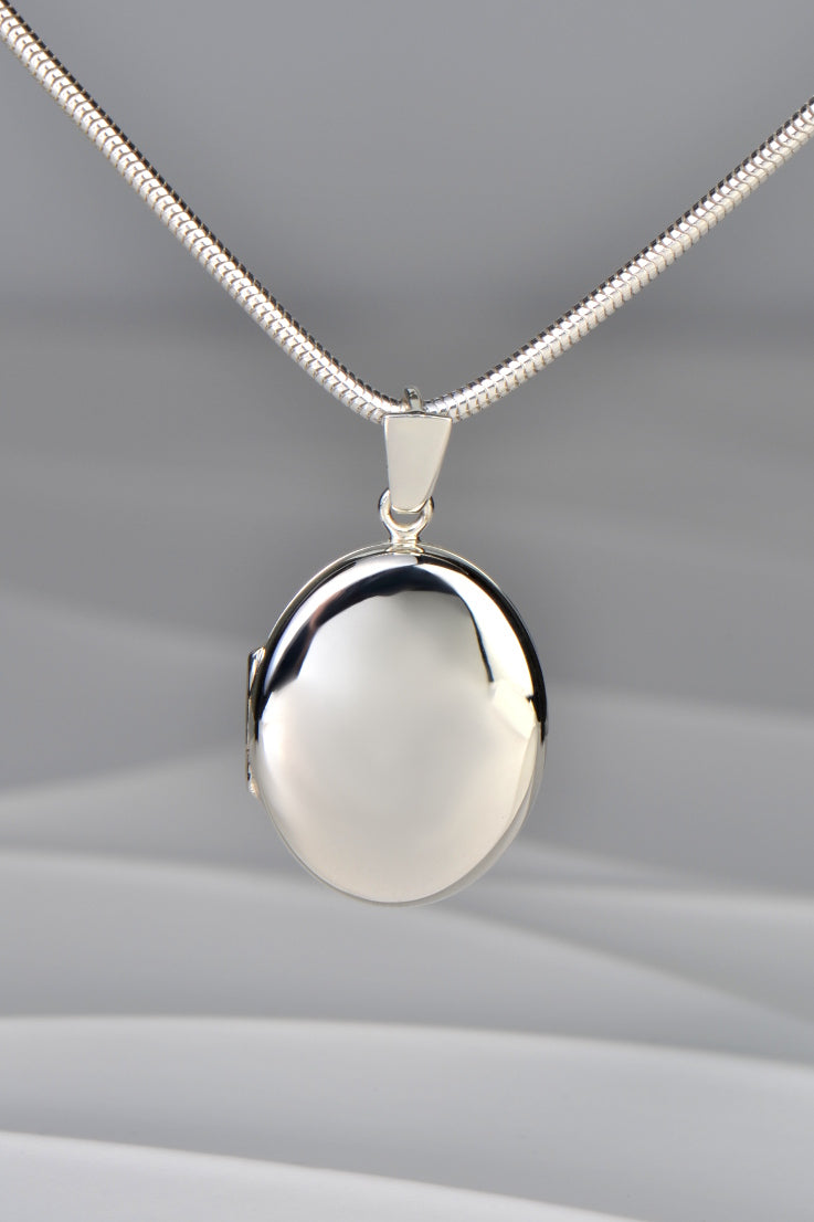 Sterling silver oval locket on sale necklace