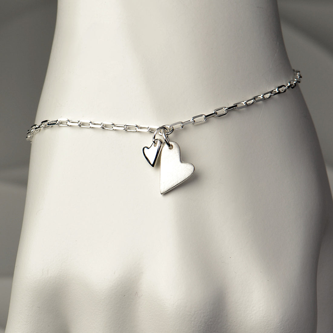 modern silver heart bracelet by Christine Sadler that is special and different