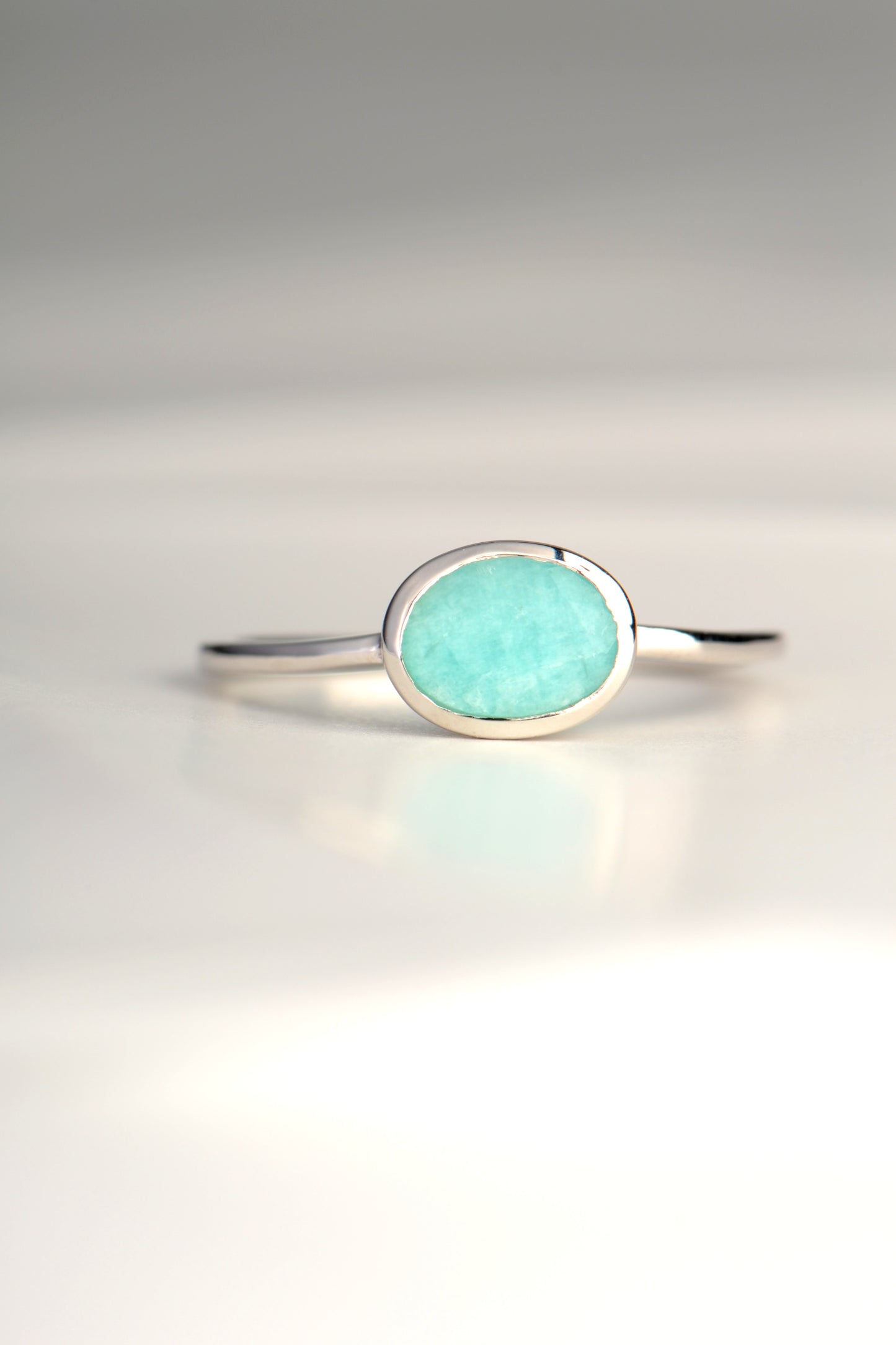 slim oval amazonite gemstone ring that is a turquoise colour set in sterling silver - Jorge Revilla