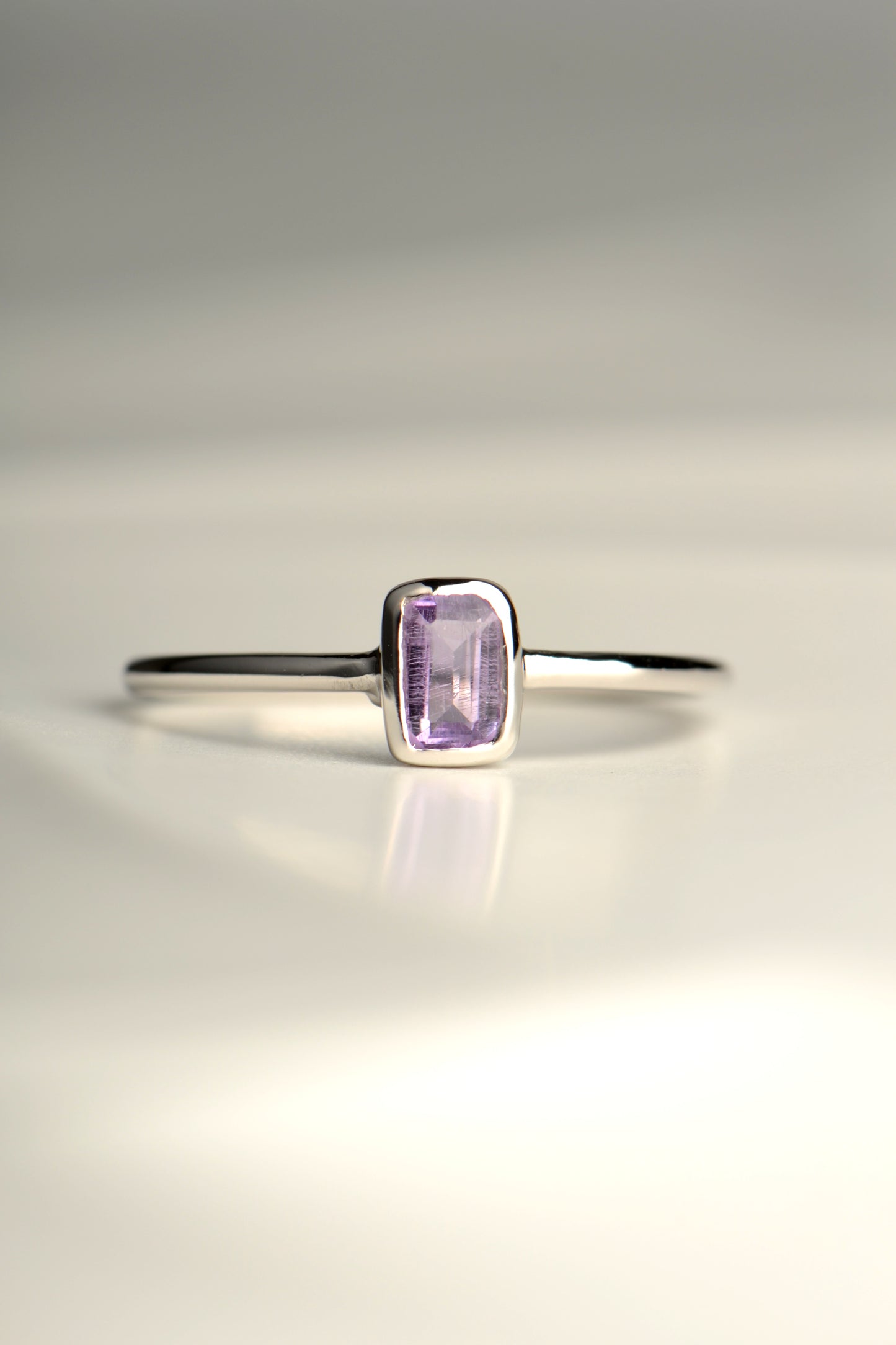 delicate silver amethyst ring with a rectangular gemstone or a woman or girl from jewellery designer Jorge Revilla