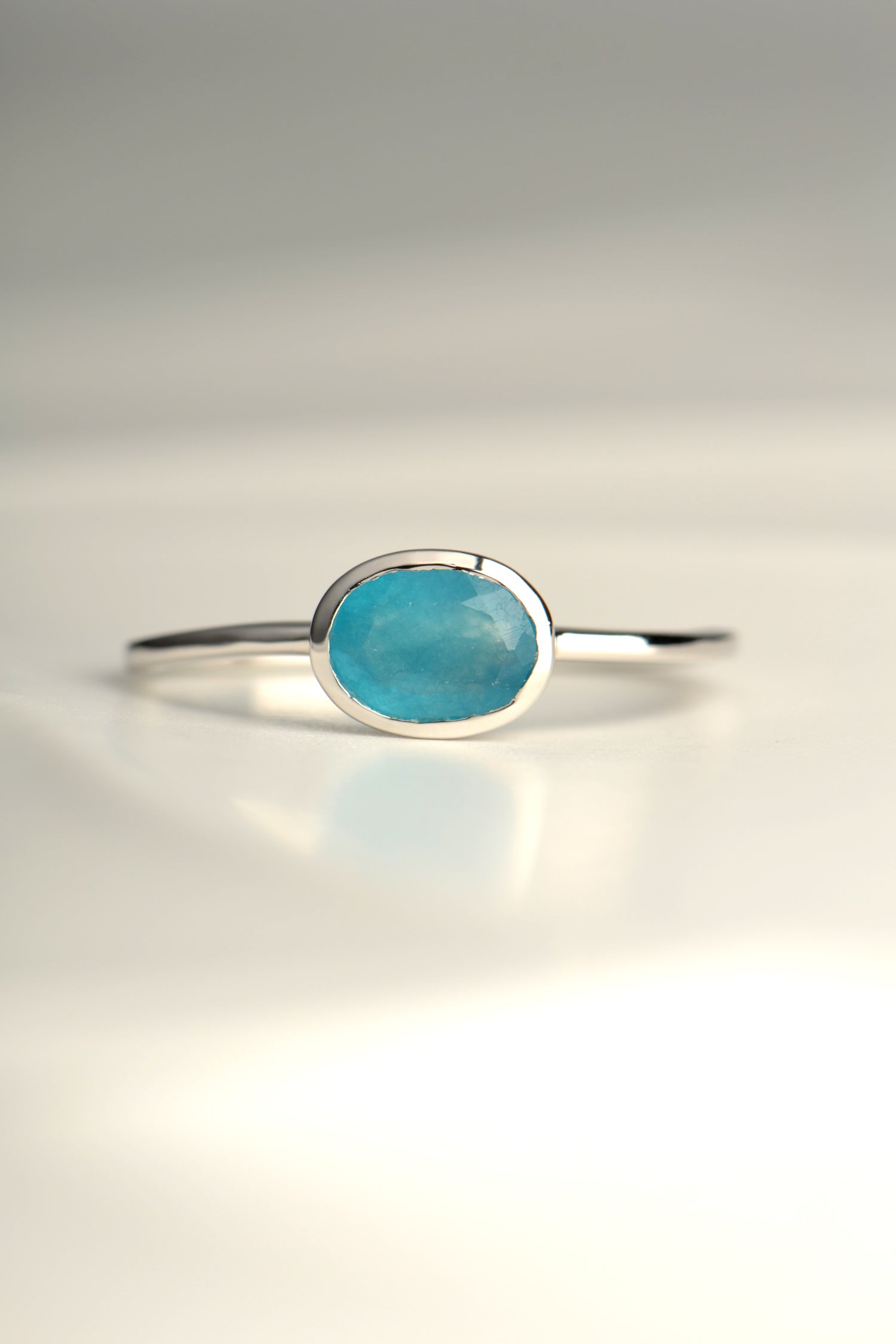 blue  green real gemstone apatite silver ring that can be worn alone or stacked with other rings from jewellery designer Jorge Revilla