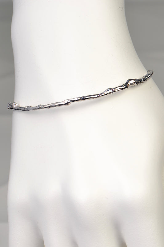 branch silver bangle for a woman that is nature inspired and organic by jewellery designer Jorge Revilla