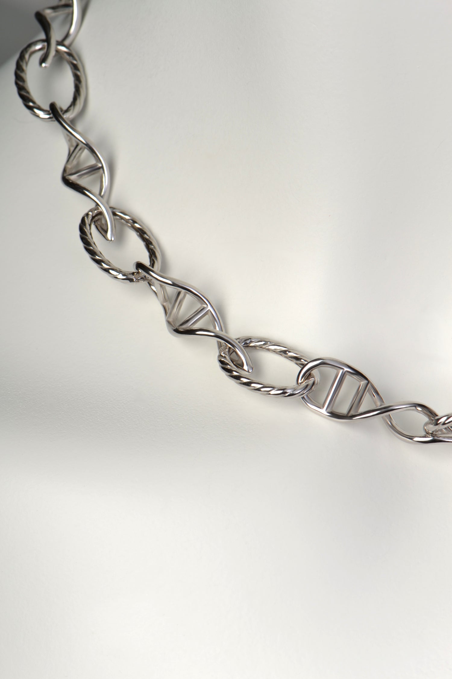 stunning statement necklace from UK jewellery designer Christine Sadler in real silver with alternating DNA shaped links and oval links with a rope texture