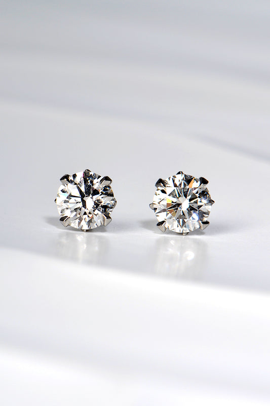 designer two carat platinum lab diamond stud earrings with a flame design - Christine Sadler