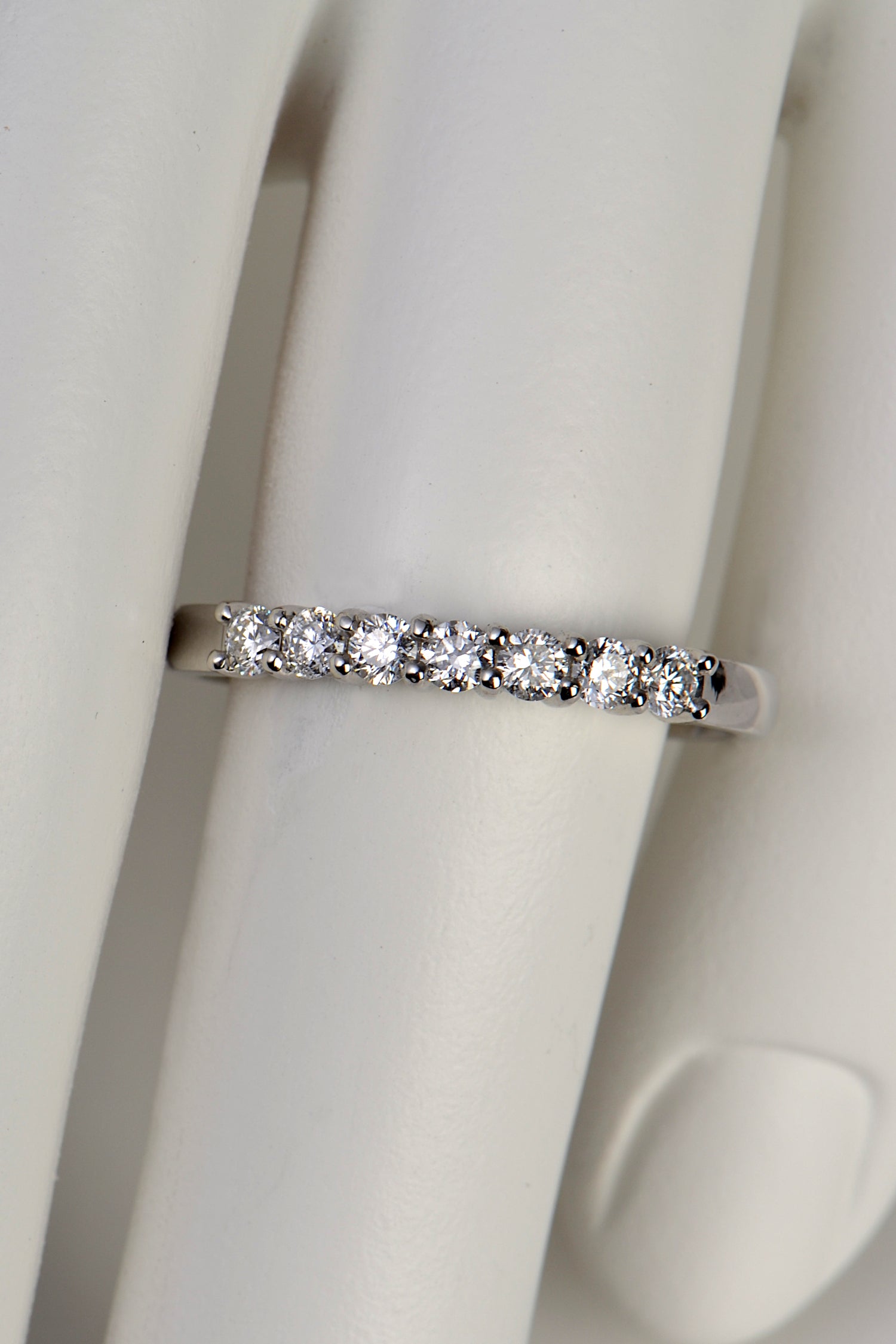 handmade british designer platinum and diamond wedding ring set with seven diamonds