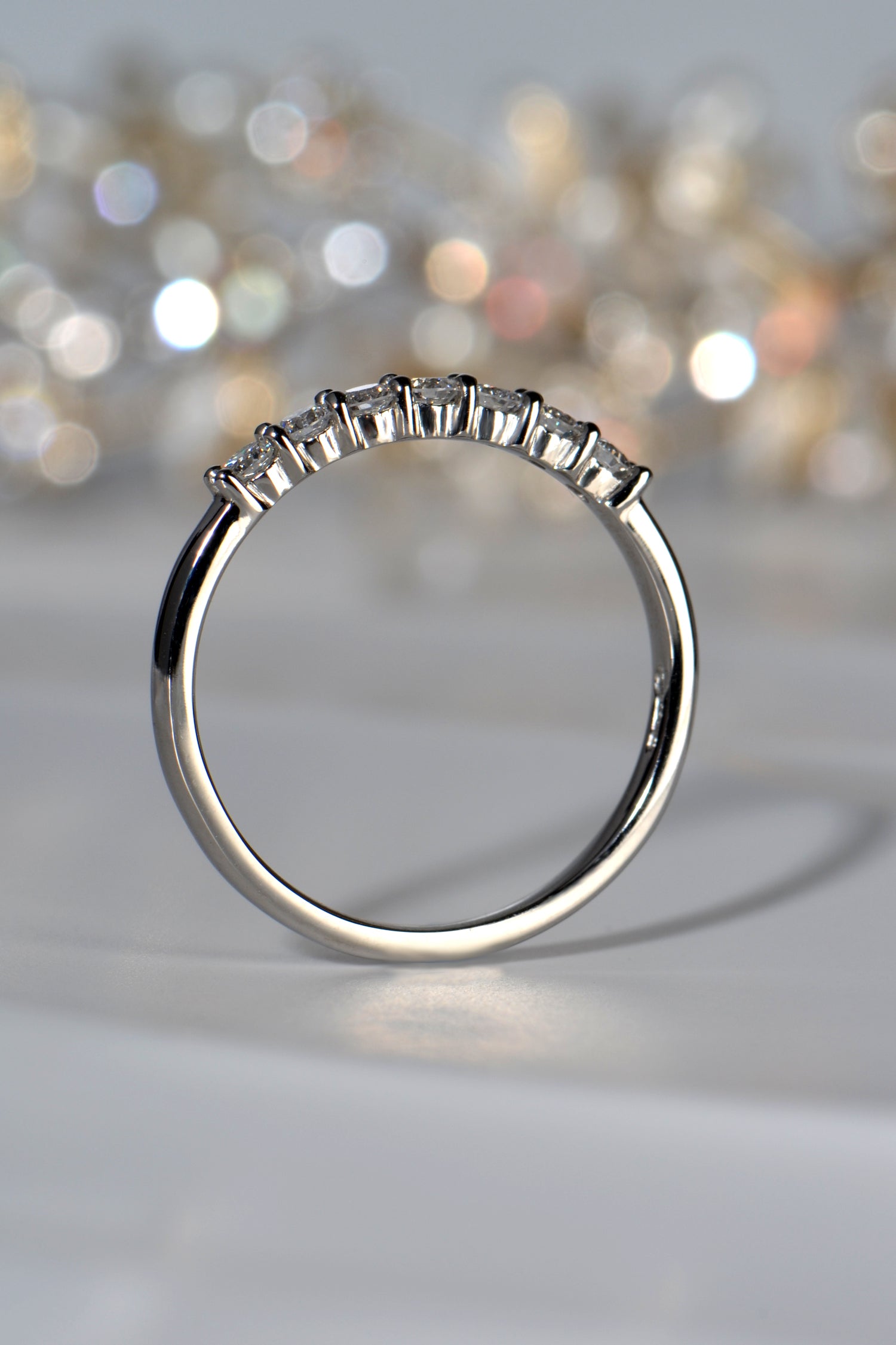 platinum diamond set wedding or eternity ring set with claws handmade in the UK