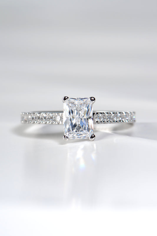 modern high quality British emerald cut diamond platinum engagement ring