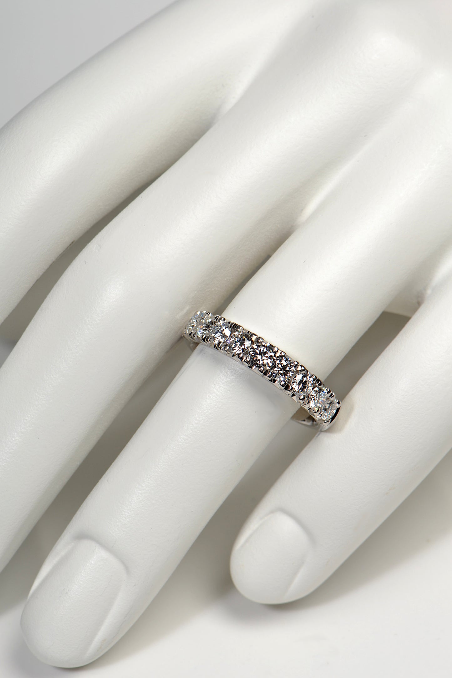 this diamond ring looks great worn on its own or with a wedding or engagement ring. 