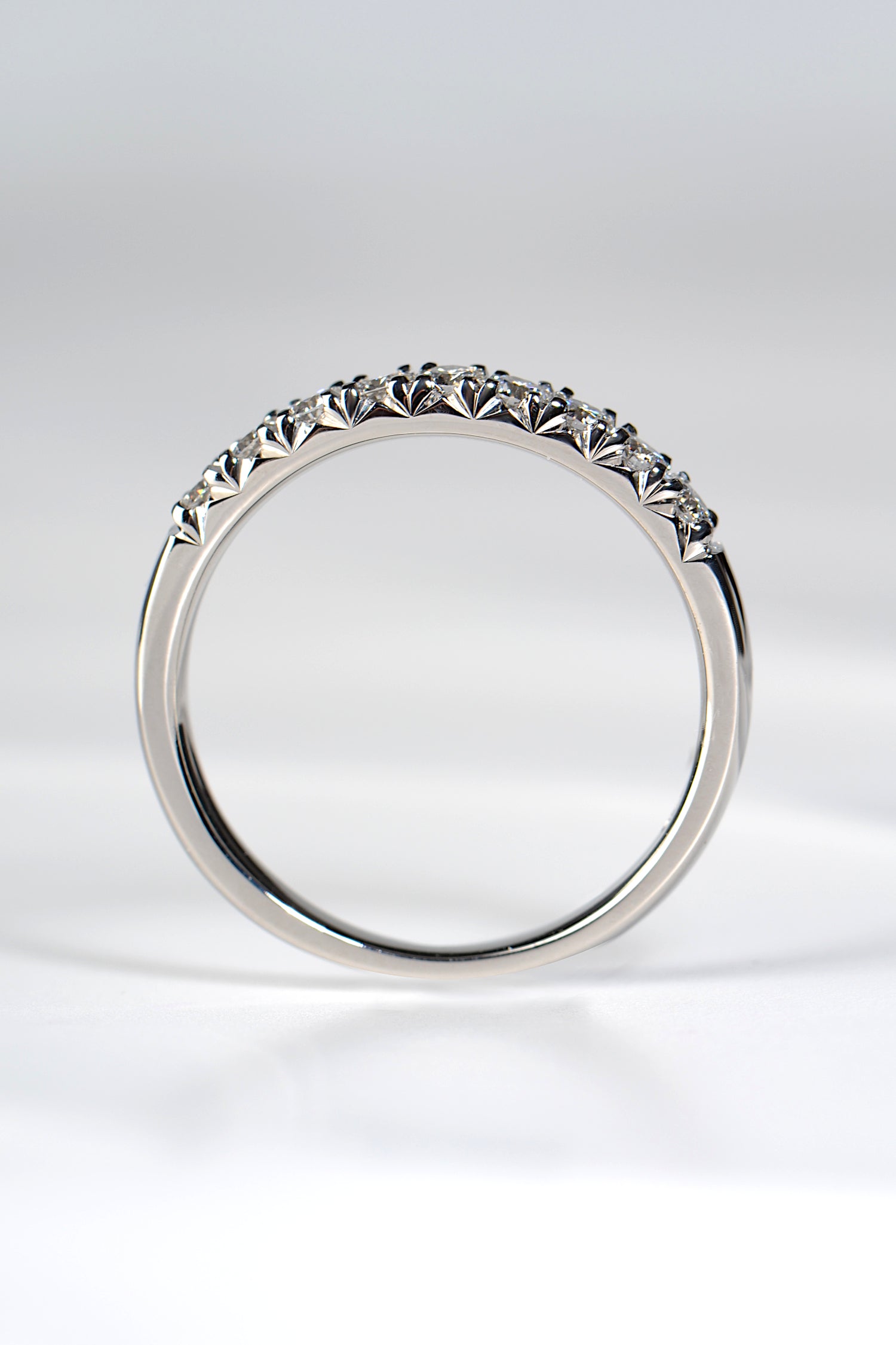 high quality fishtail diamond set platinum ring made in the UK