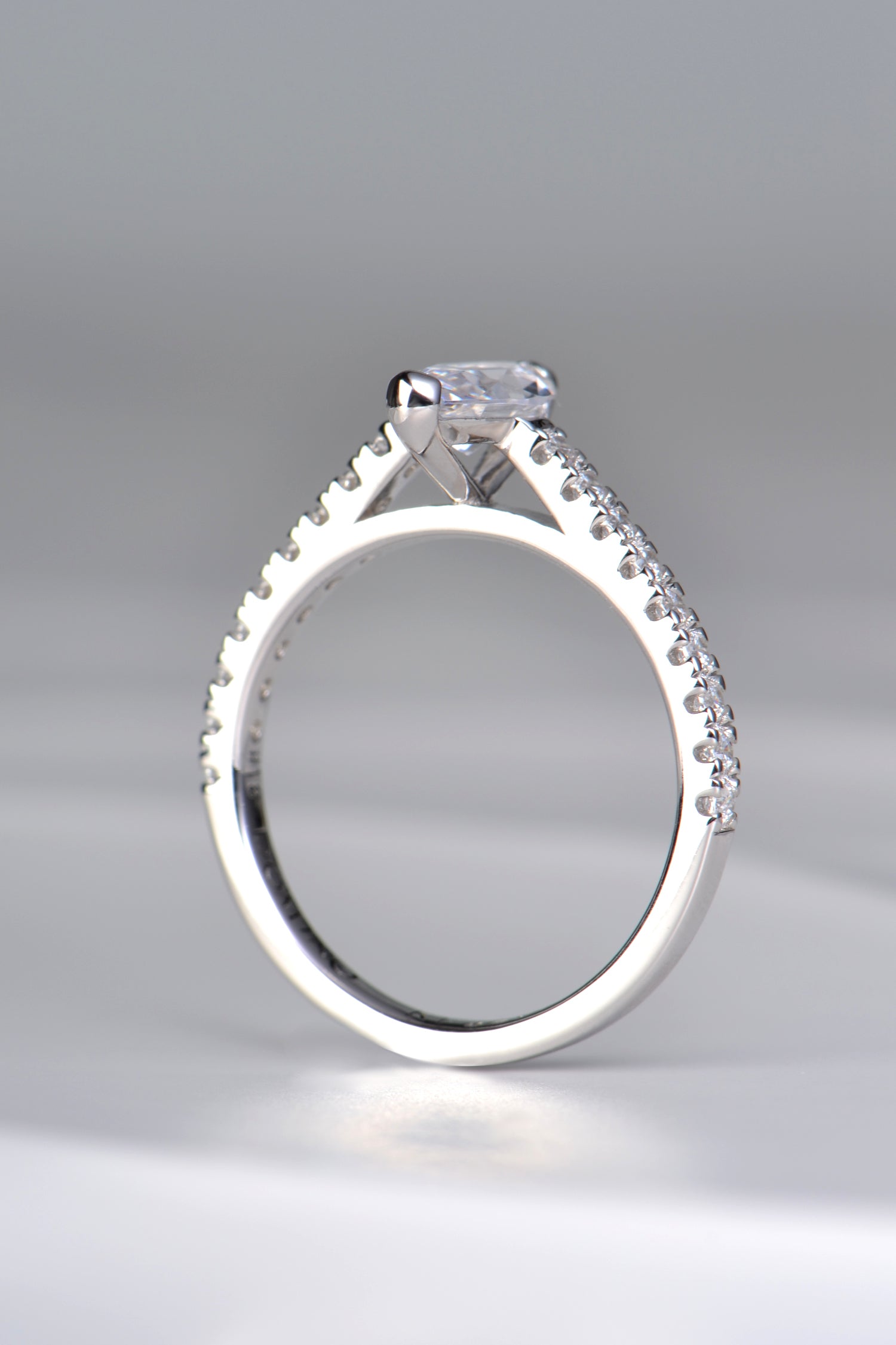 British platinum and diamond engagement ring with a marquise diamond in the middle