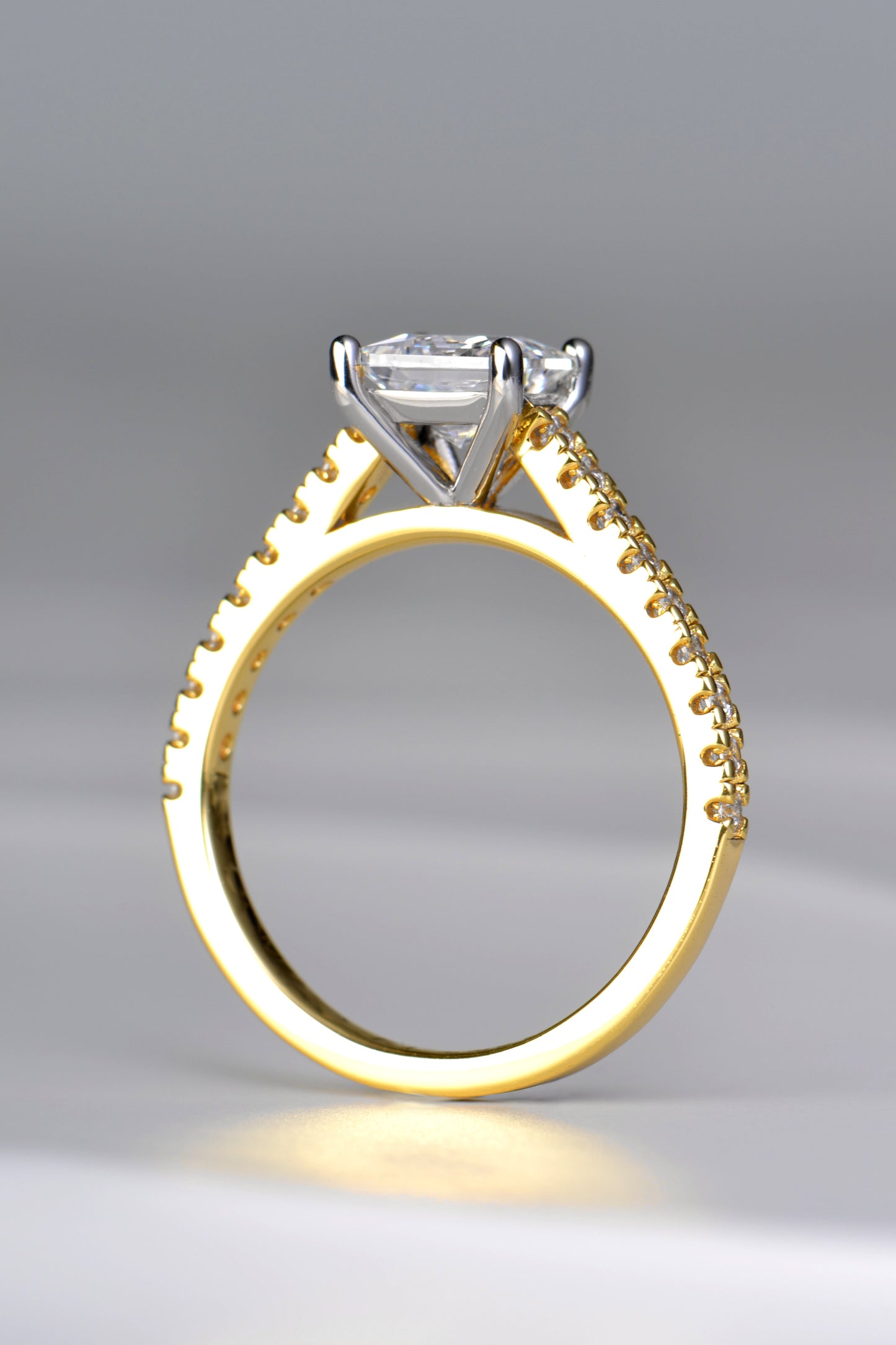 contemporary high quality yellow gold and platinum diamond engagement ring