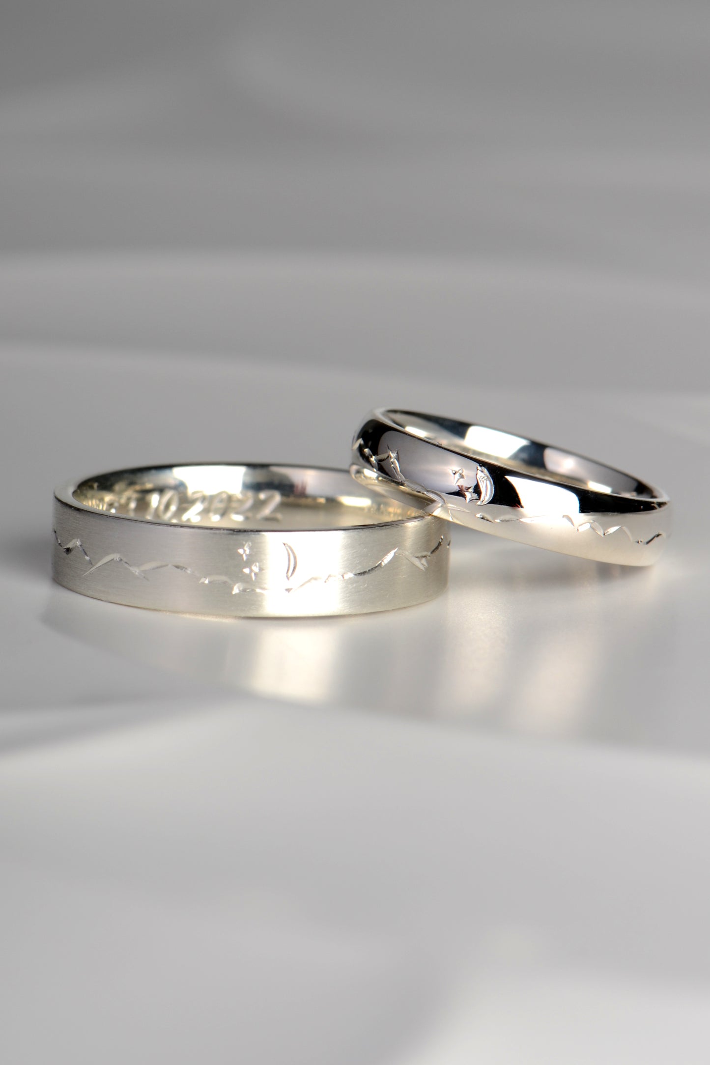 handmade designer wedding rings with mountains and moon and stars from jewellery designer Christine Sadler