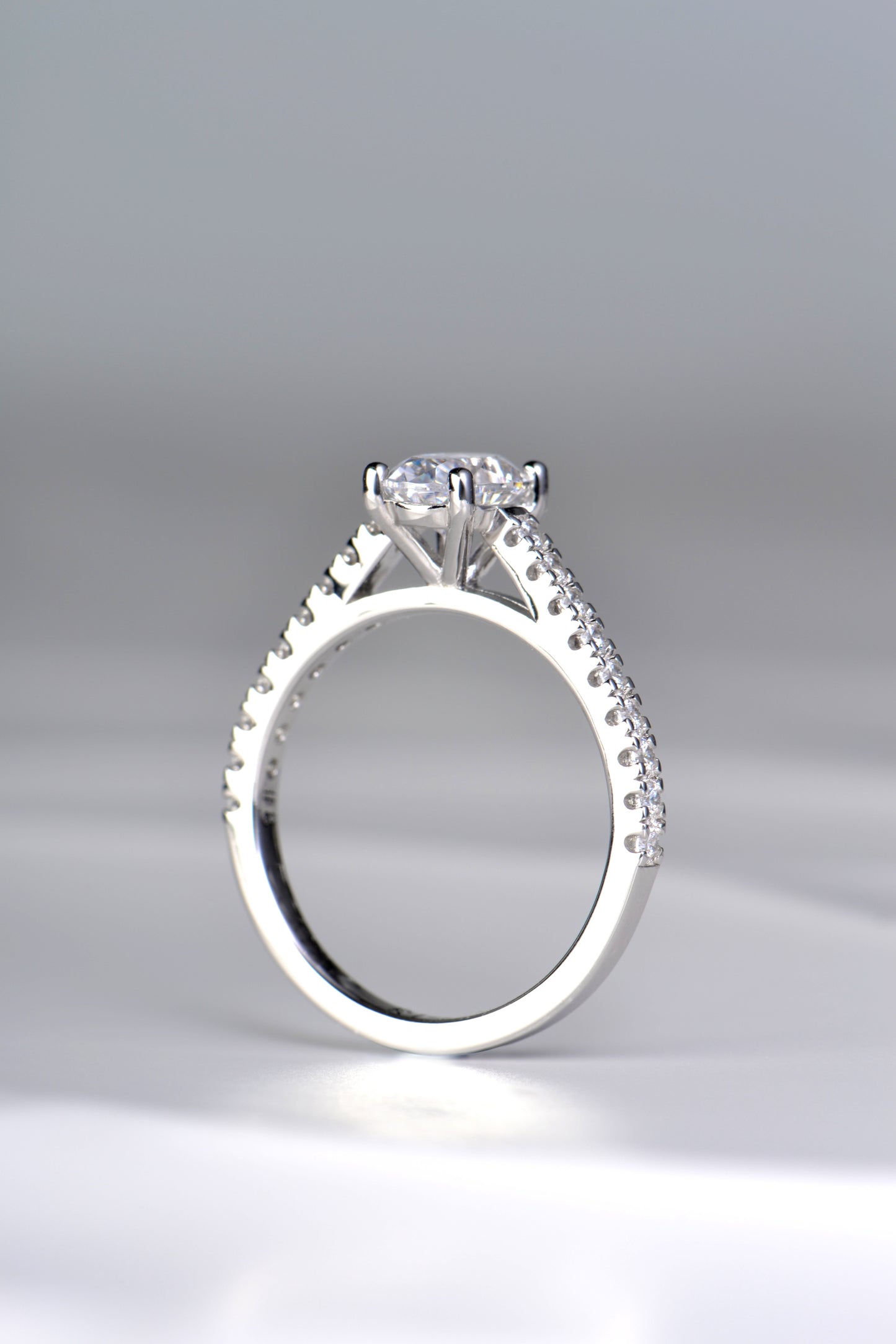 elegant four claw oval diamond platinum engagement ring made in the UK