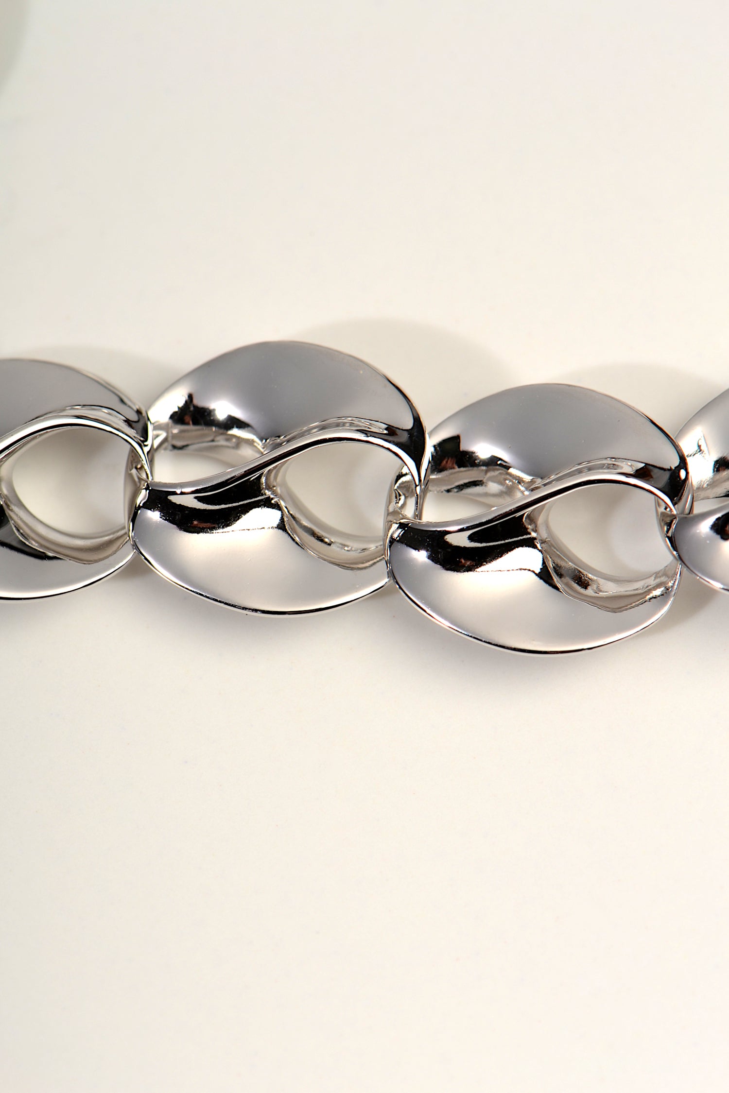 contemporary mobius design silver bracelet with highly polished links by designed by Jorge Revilla