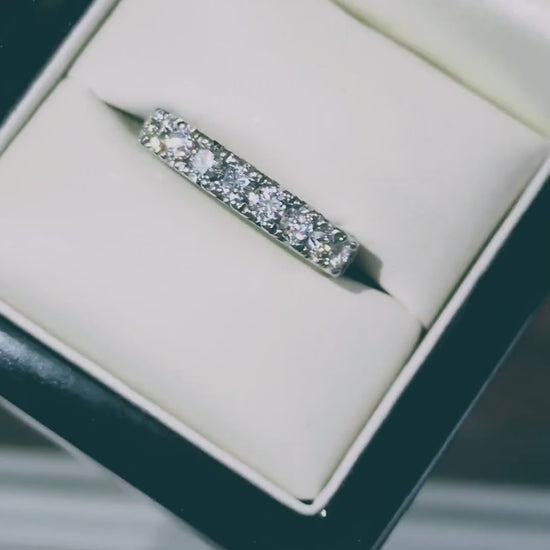 stunning platinum eternity ring set with nine round briliant cut diamonds that have incredible sparkle and have a total diamond carat weight of one carat. 