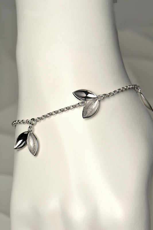 The Promise seed charm bracelet is modern and special. For each one sold, a tree is planted in Scotland