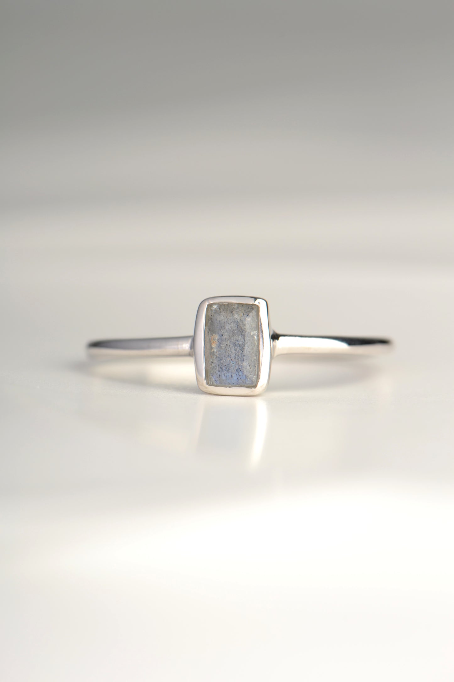 affordable silver gemstone ring set with a rectangular Labradorite gemstone from jewellery designer Jorge Revilla