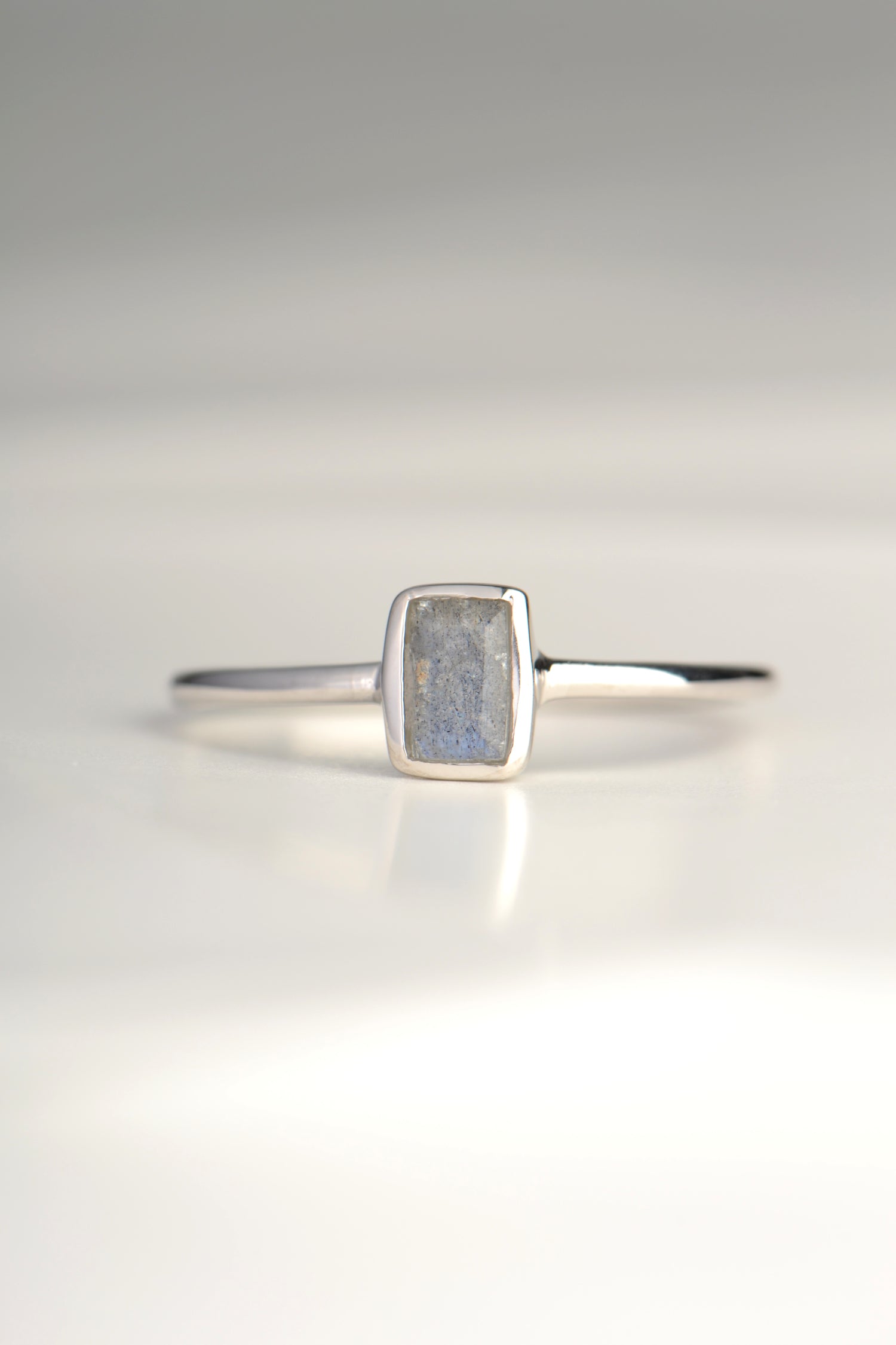 affordable silver gemstone ring set with a rectangular Labradorite gemstone from jewellery designer Jorge Revilla