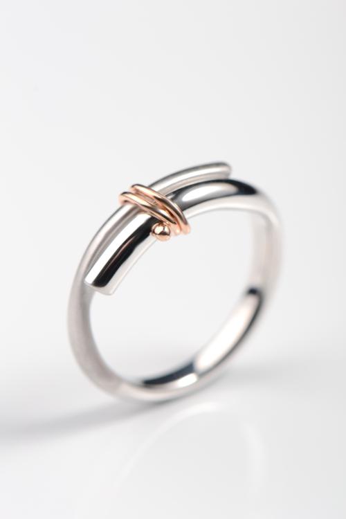 silver and rose gold designer ring