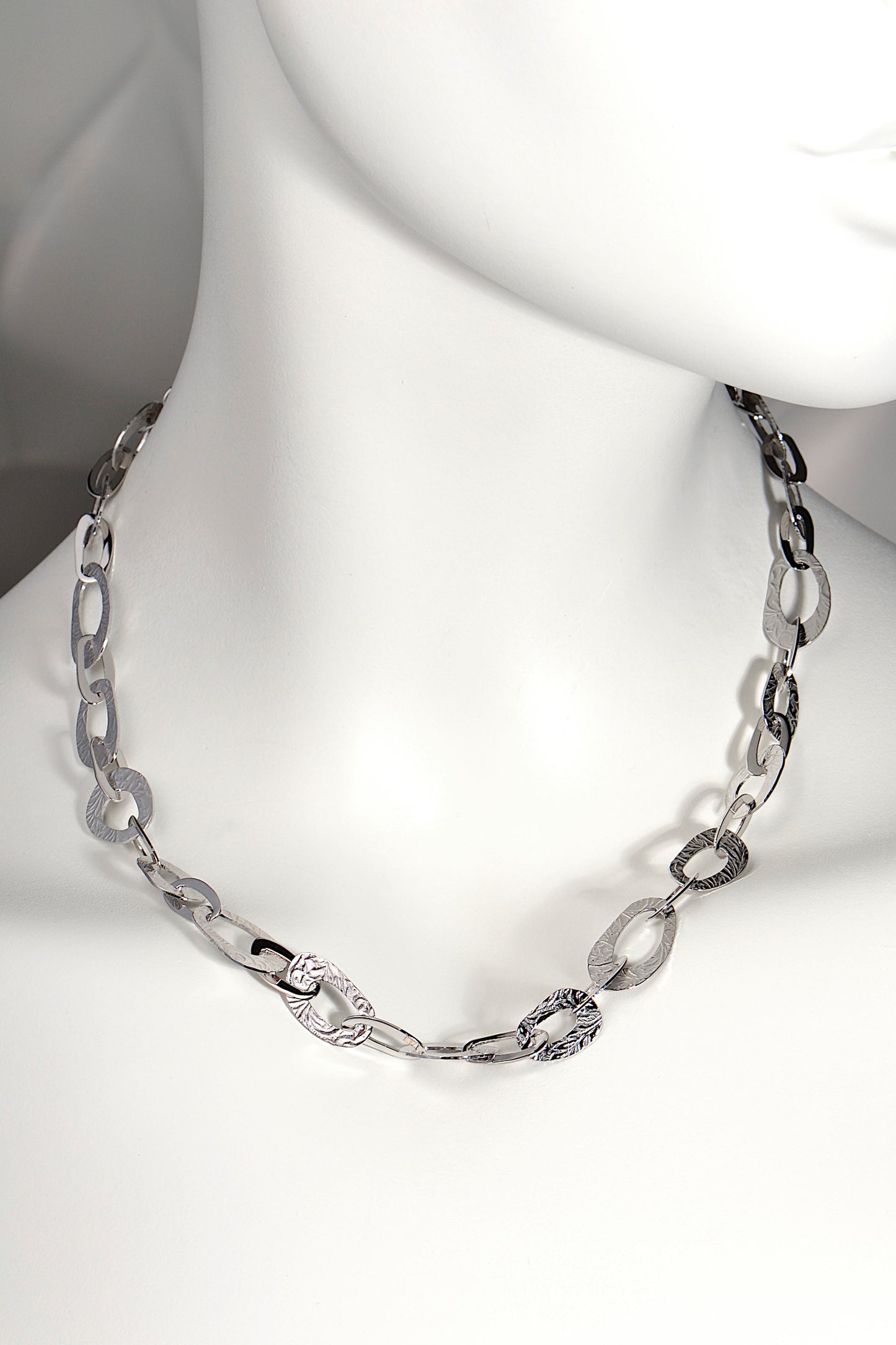 organic silver necklace design with embossed pattern that looks like frost patterns. Natural beauty jewellery collection from Christine Sadler