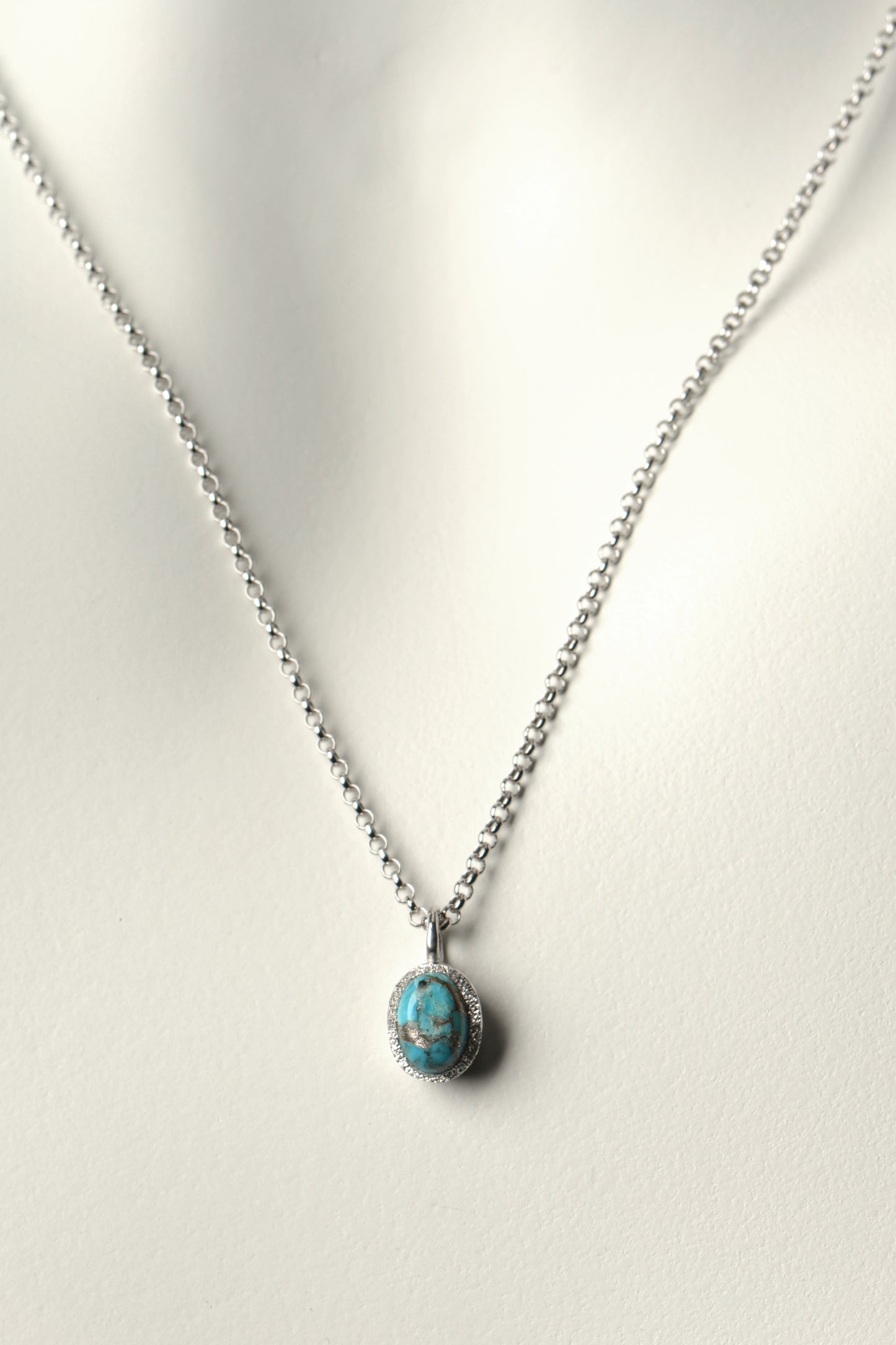 small cabachon cut Turquoise gemstone necklace in sterling silver by jewellery designer Jorge Revilla