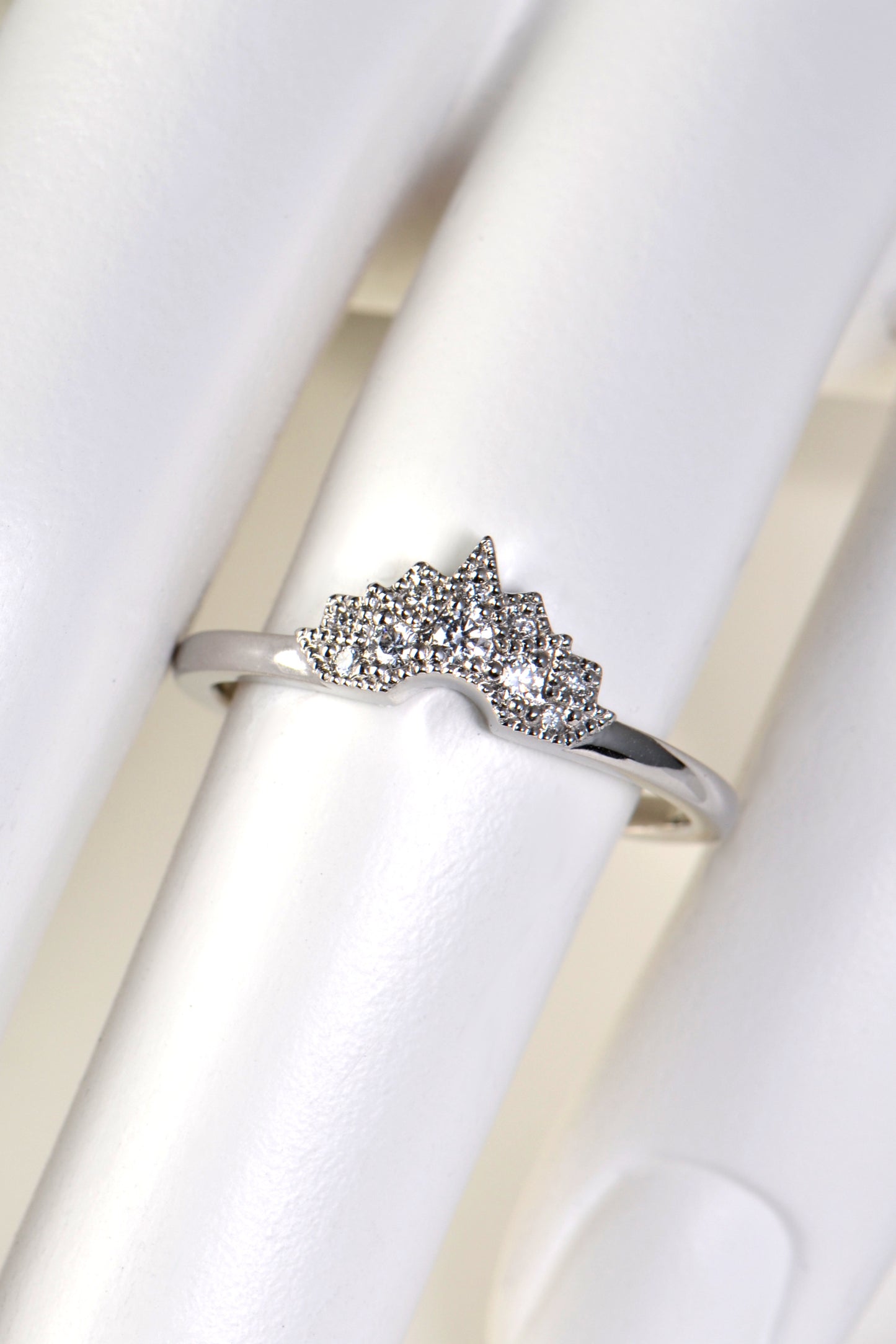 shaped wedding ring in platinum set with diamonds in a art deco starburst design